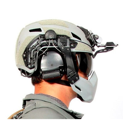 Galvion Batlskin Caiman NVG Arm Visor with Smoke Lens in use with Caiman Hybrid Helmet and Caiman Bump Mandible Guard